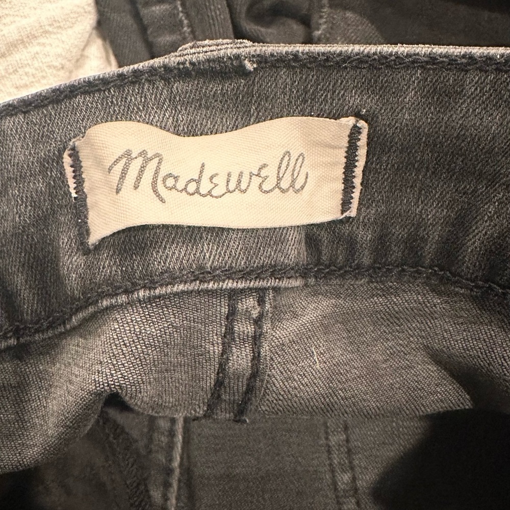 Madewell distressed black skinny jeans
